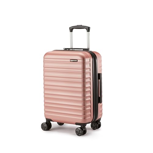 Amazon Basics - Mala de viagem rígida giratória, Or rosa, 1 Peça