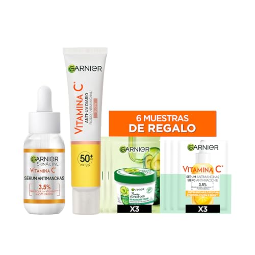 Garnier SkinActive Vitamina C Rotina anti-manchas: UV Fluid FPS 50 Glow 50 ml + sérum antimanchas, dia 30 ml + amostras de presente (3 x mistura creme corporal antimanchas e 3 x sérum antimanchas)