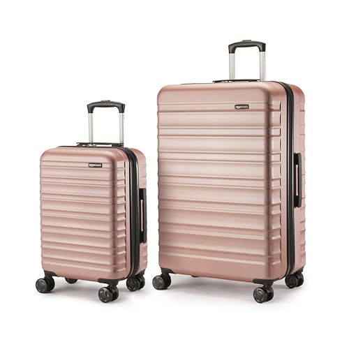 Amazon Basics - Mala de viagem rígida giratória, Or rosa, Conjunto de 2 unidades