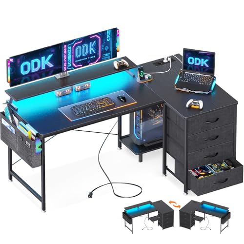 ODK Mesa de canto reversível, 140 x 80 x 84,7 cm mesa de jogos em L com LED, mesa em L com 4 gavetas, mesa de computador com porta de carregamento USB e tomada de energia para casa, preto