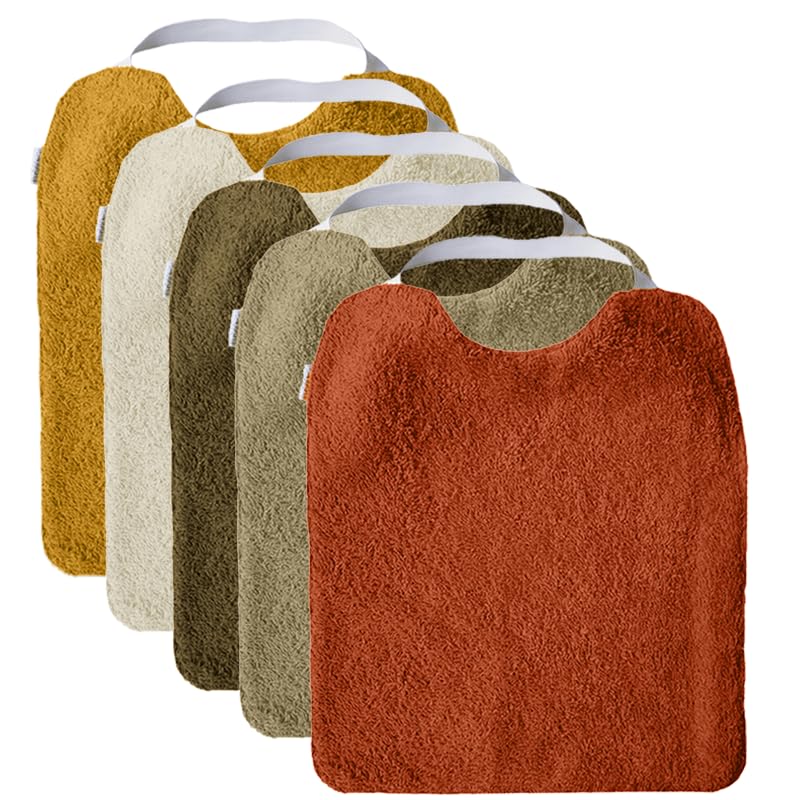 Conjunto de 5 babetes de turco com elástico, para promover a autonomia Laváveis, com interior impermeável e tecido turco de alta qualidade. Babete com gola de borracha. Fabricado em Espanha.